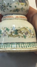 A Chinese polychrome 'Erotic' vase, an iron-red 'Phoenix' jar and a famille verte 'Dragon' stand,  Chun Yi Tang Zhi 春怡堂制 and Tongzhi mark, 19/20th C.