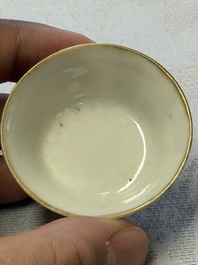 A set of seven Chinese famille rose nesting bowls with narrative design, Daoguang