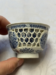 A Chinese blue and white reticulated double-walled cup and a pierced 'Hatcher Cargo' type bowl, Transitional/Kangxi