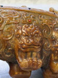 A Chinese precious-stone-inlaid carved soapstone wine vessel on stand, Gong 觥, Republic