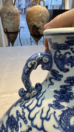 A Chinese blue and white moonflask vase with dragons, 'bianhu', Qianlong mark, Republic
