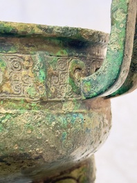 An inscribed Chinese archaic bronze food vessel and stand, You Pan Ding 有盤鼎, Western Zhou