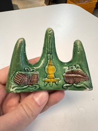 Three Chinese verte biscuit and turquoise-glazed brush rests, Kangxi and later