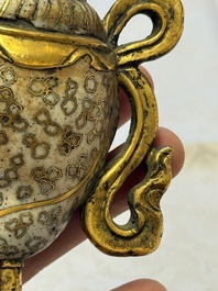 A Chinese parcel-gilt cloisonn&eacute; and bronze 'Conch Shell' Buddhist emblem, 18/19th C.