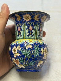A Chinese Canton enamel 'Prunus on Cracked Ice' spittoon and two snuff dishes, 19th C.