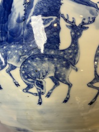 A Chinese blue and white '100 Deers' 'Zun' vase on wooden stand, Kangxi mark, 19th C.