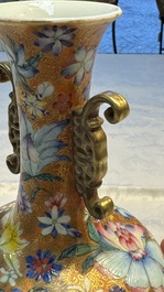 A pair of Chinese famille rose 'Millefleur' vases, Qianlong mark, Republic