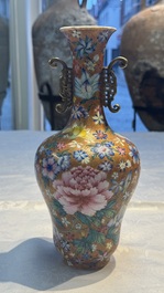 A pair of Chinese famille rose 'Millefleur' vases, Qianlong mark, Republic