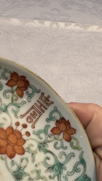 A Chinese qianjiang cai dish and a plate, two famille rose plates and a saucer, Chenghua, Yongzheng and Guangxu marks, 19th C.
