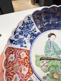 A rare pair of Chinese famille verte lobed plates with elegant ladies, Kangxi