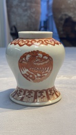 A Chinese polychrome 'Erotic' vase, an iron-red 'Phoenix' jar and a famille verte 'Dragon' stand,  Chun Yi Tang Zhi 春怡堂制 and Tongzhi mark, 19/20th C.