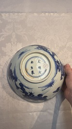 A Chinese blue and white 'Butterflies and Flowers' bowl, Transitional period