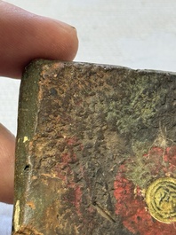 A gilt polychrome stucco votive plaque, Tsha Tsha, Tibet, 18/19th C.