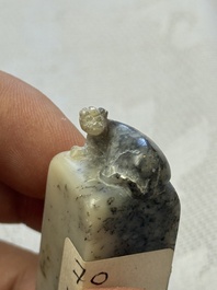 A Chinese soapstone seal with a carved mythical animal, inscribed Ying Hua Hong Bai Shang 樱花红陌上, 19/20th C.