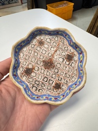 A Chinese famille rose nine-piece 'Plum Blossoms' sweetmeat set on a wooden tray, 19th C.