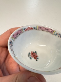A Chinese famille rose 'Fishermen' cup and saucer, Yongzheng