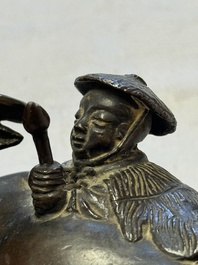 A Chinese bronze 'Boy and Buffalo' paperweight, Ming
