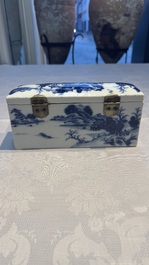 A rare Chinese blue and white 'Mountainous Landscape' writing set with an inkwell, sander and candlestick, Qianlong