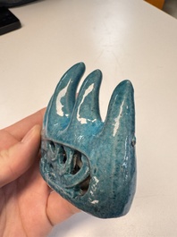 Three Chinese verte biscuit and turquoise-glazed brush rests, Kangxi and later