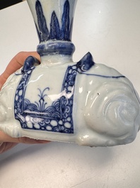 Two Chinese blue and white recumbent elephant-form candlesticks, Jiaqing