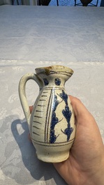 A rare intact early Italian maiolica ewer inscribed 'G', Montelupo, 15th C.