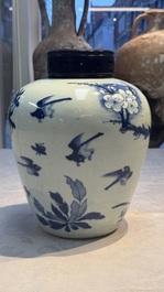 A Chinese blue and white 'Three Friends of Winter' jar with an openworked wooden cover, Transitional period