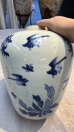 A Chinese blue and white 'Three Friends of Winter' jar with an openworked wooden cover, Transitional period