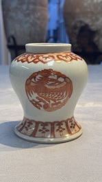 A Chinese polychrome 'Erotic' vase, an iron-red 'Phoenix' jar and a famille verte 'Dragon' stand,  Chun Yi Tang Zhi 春怡堂制 and Tongzhi mark, 19/20th C.