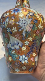 A pair of Chinese famille rose 'Millefleur' vases, Qianlong mark, Republic