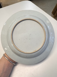 A pair of Chinese armorial soup plates with the arms of Saunders for the English market, Qianlong, ca. 1745