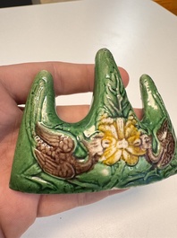 Three Chinese verte biscuit and turquoise-glazed brush rests, Kangxi and later