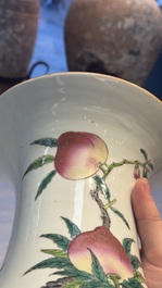A Chinese famille rose 'Nine Peaches' 'Gu' vase, 19th C.