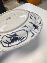 A rare Japanese Kutani oval 'Dutchmen' dish, seal mark, Edo, 17/18th C.