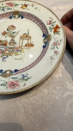 A Chinese famille rose gilt-decorated 'Antiquities' plate, Yongzheng