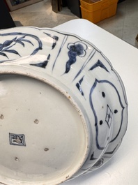 A rare Japanese Kutani oval 'Dutchmen' dish, seal mark, Edo, 17/18th C.