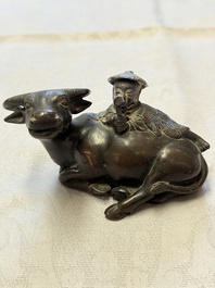 A Chinese bronze 'Boy and Buffalo' paperweight, Ming