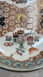 A Chinese qianjiang cai dish and a plate, two famille rose plates and a saucer, Chenghua, Yongzheng and Guangxu marks, 19th C.