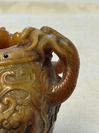 A Chinese precious-stone-inlaid carved soapstone wine vessel on stand, Gong 觥, Republic