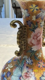 A pair of Chinese famille rose 'Millefleur' vases, Qianlong mark, Republic