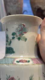 A pair of Chinese famille rose 'Pheasant among Flowering Branches' vases, 19th C.