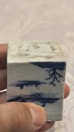 A rare Chinese blue and white 'Mountainous Landscape' writing set with an inkwell, sander and candlestick, Qianlong