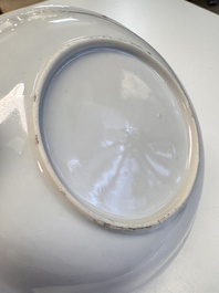A Chinese famille rose 'Fishermen' cup and saucer, Yongzheng