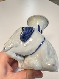 Two Chinese blue and white recumbent elephant-form candlesticks, Jiaqing