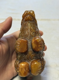 A Chinese precious-stone-inlaid carved soapstone wine vessel on stand, Gong 觥, Republic
