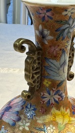 A pair of Chinese famille rose 'Millefleur' vases, Qianlong mark, Republic