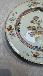 A Chinese famille rose gilt-decorated 'Antiquities' plate, Yongzheng