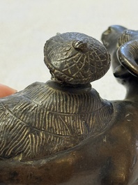 A Chinese bronze 'Boy and Buffalo' paperweight, Ming