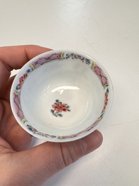 A Chinese famille rose 'Fishermen' cup and saucer, Yongzheng