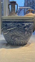 A Chinese blue and white 'Fish' scroll pot, 19th C.