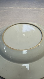 A Chinese famille rose gilt-decorated 'Antiquities' plate, Yongzheng